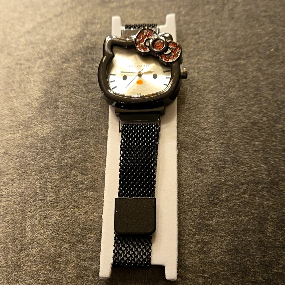 Hello Kitty gunmetal black mesh watch w/ pink crystals. Great gifts